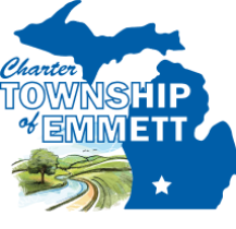 Charter Township of Emmett logo. There is a blue state of Michigan with a star where Emmett Township is located. A flowing river with a green tree and green grass surrounding the river.